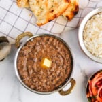 Dal Bukhara served in a kadai with dollop of butter