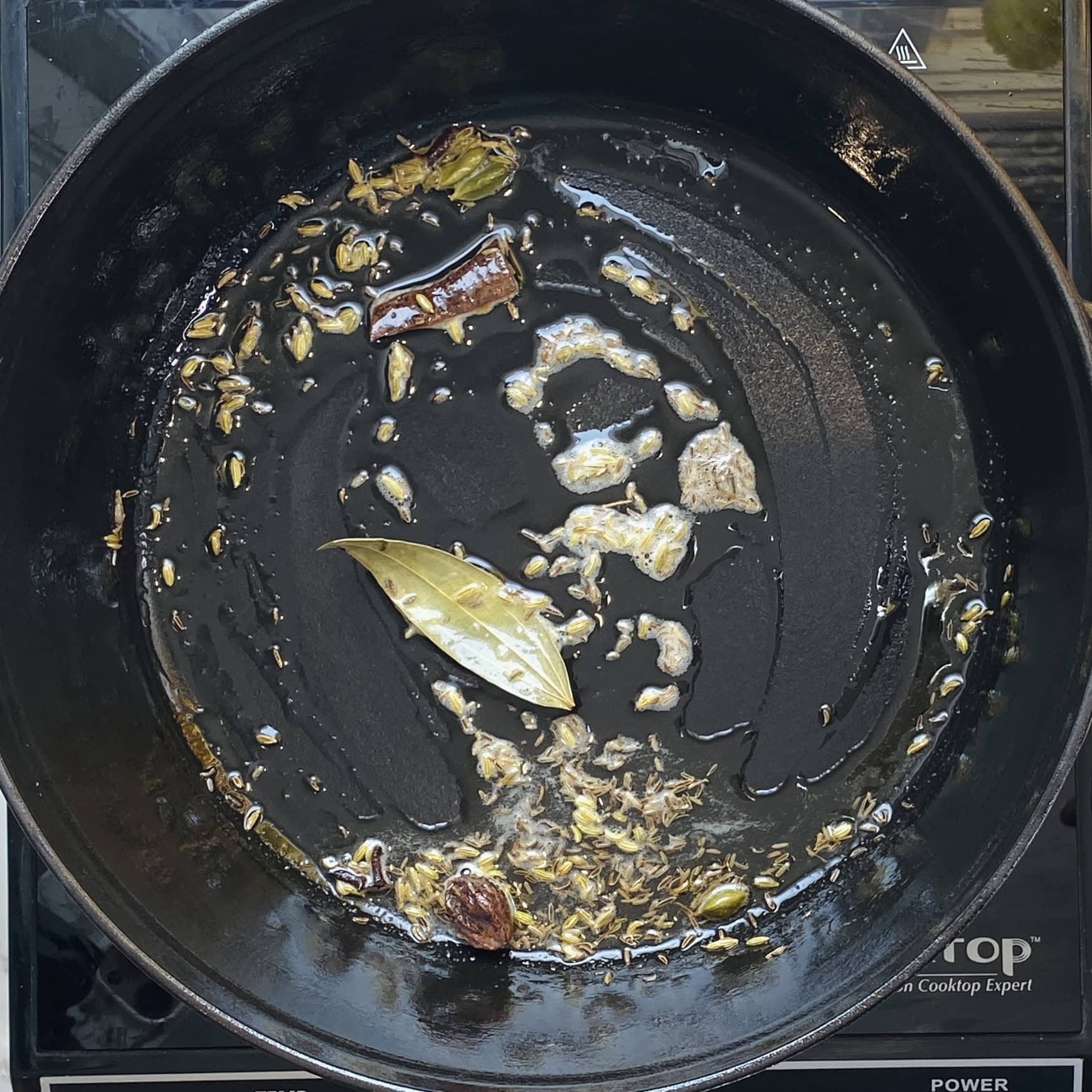 sauteeing whole spices in ghee