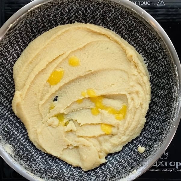ghee drizzled over ricotta mixture 
