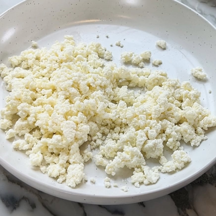 homemade mawa from ricotta cheese in a bowl.