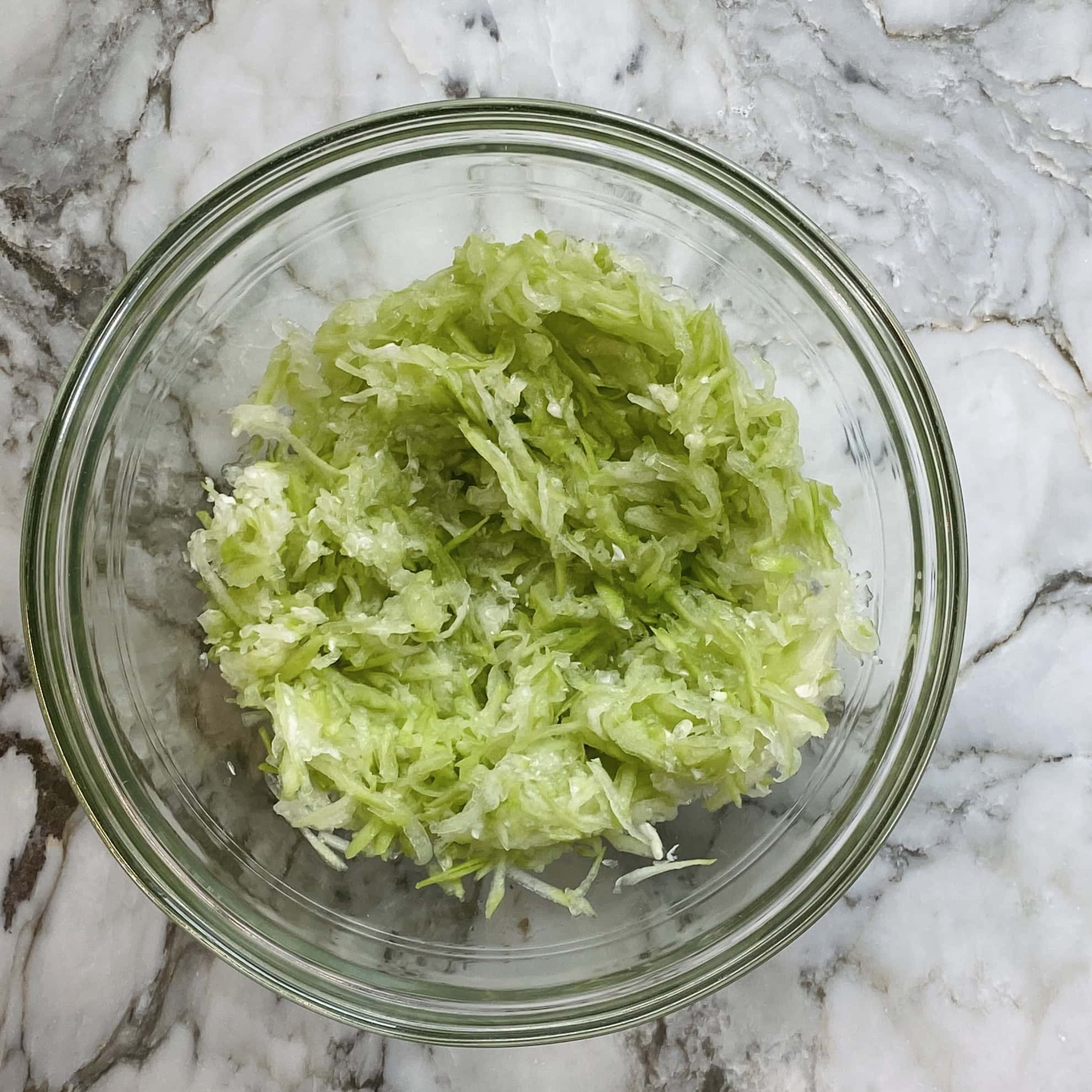 grated dudhi in a bowl 