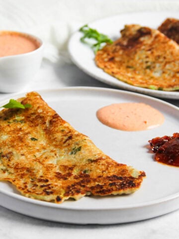 Dudhi Chilla served with chutney and pickle