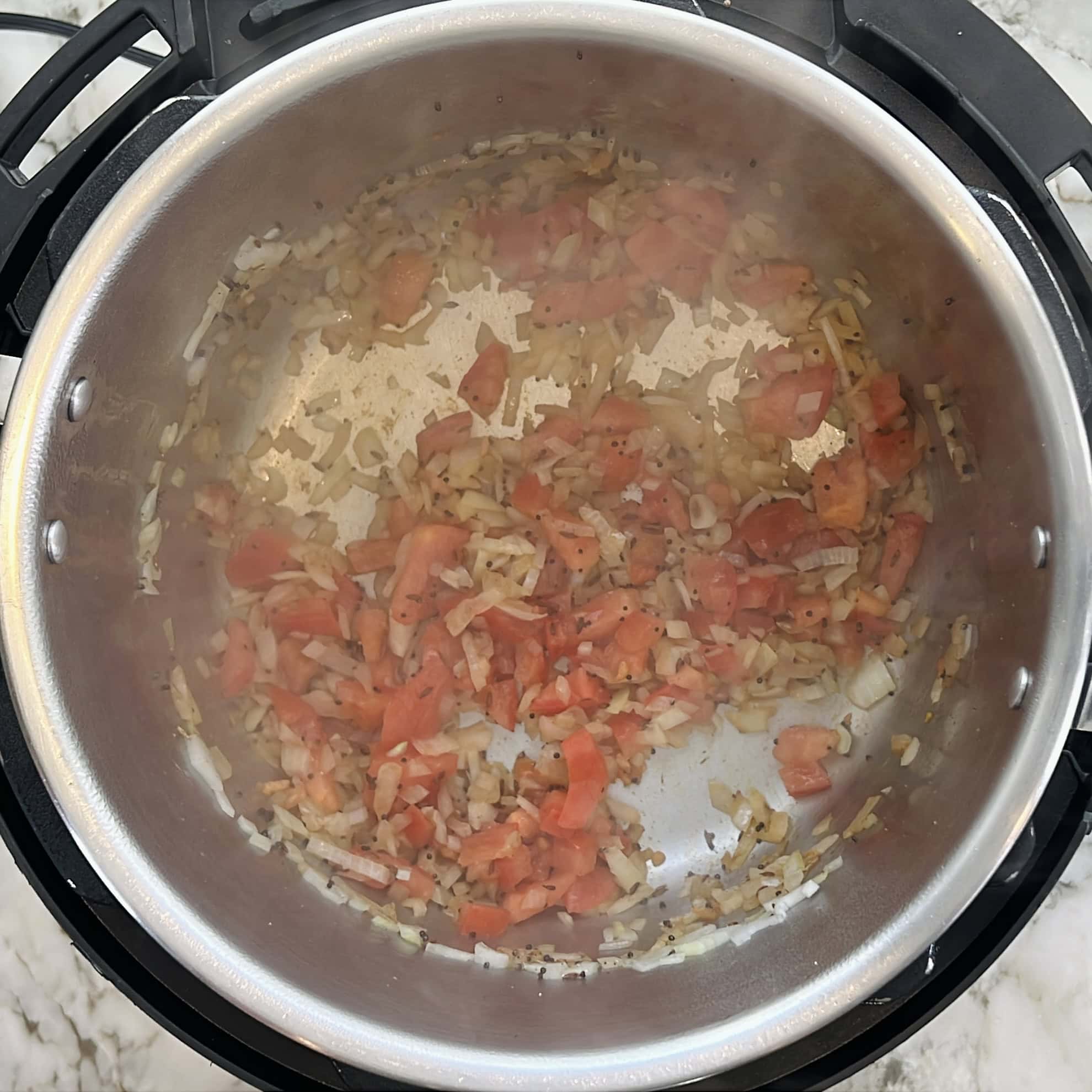 sautéing onions and tomatoes in the instant pot 