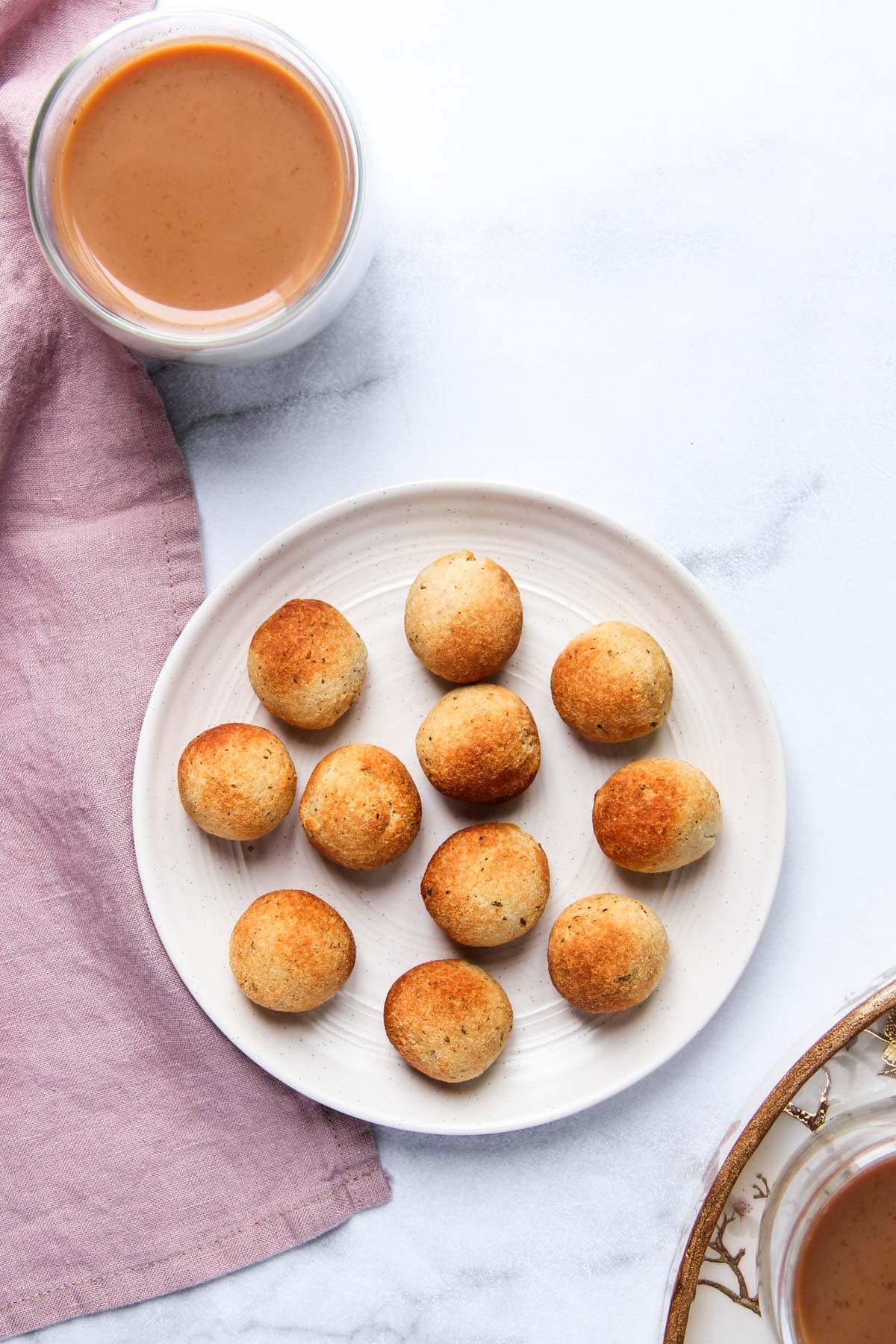 Cumin & Black Pepper Bagel Bites served in a white plate