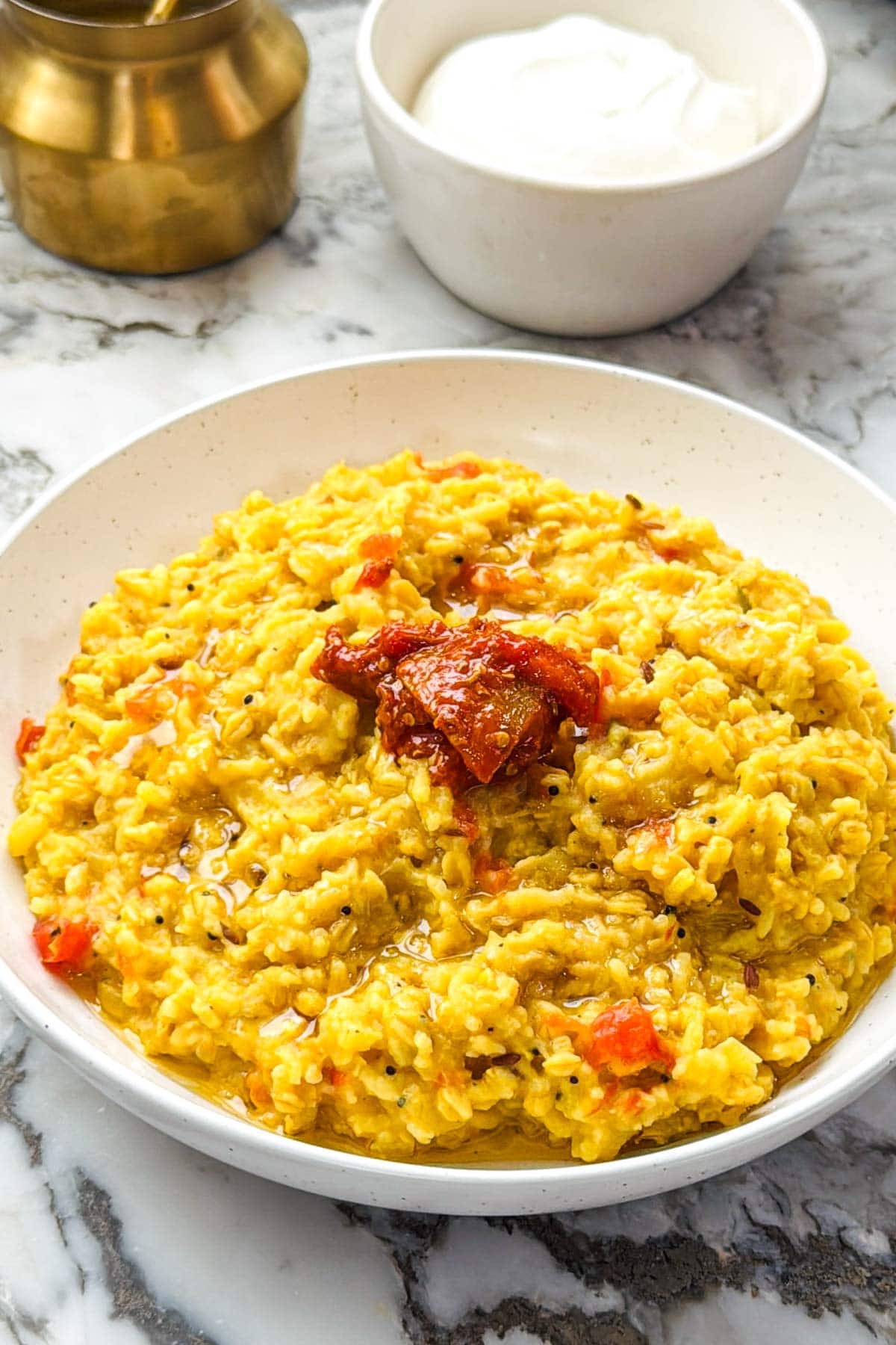 kitchari served with ghee and achaar