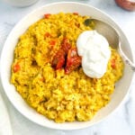protein oats khichdi served with pickle and greek yogurt