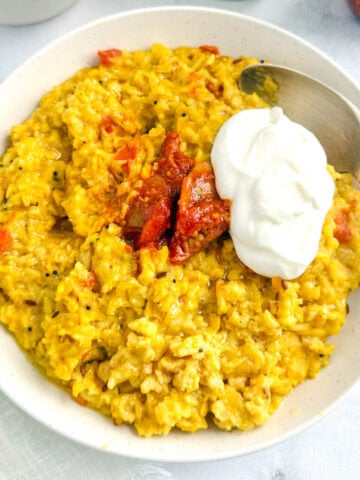 protein oats khichdi served with pickle and greek yogurt