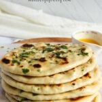 pinterest pin with a stack of homemade naan