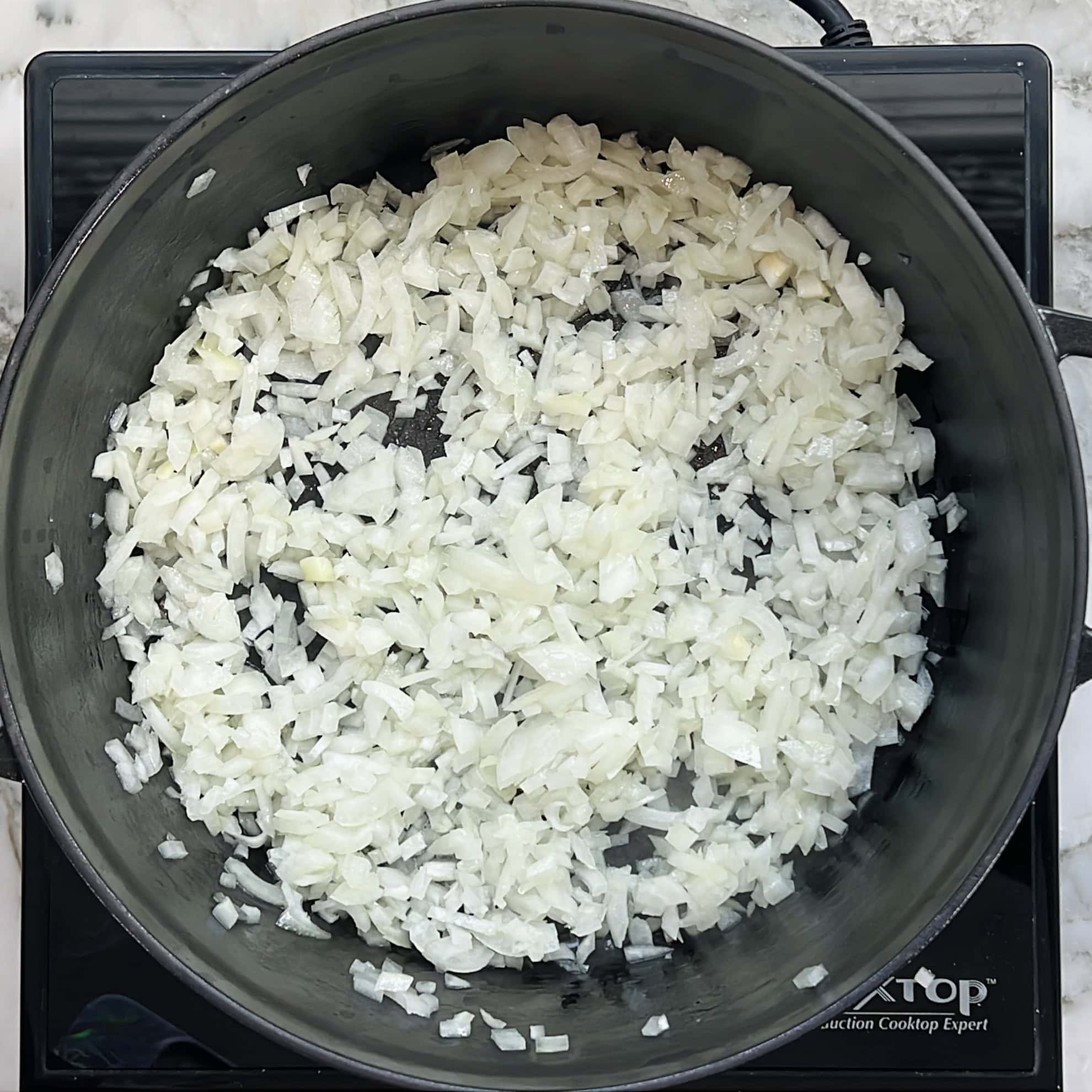 diced onions in a pan.