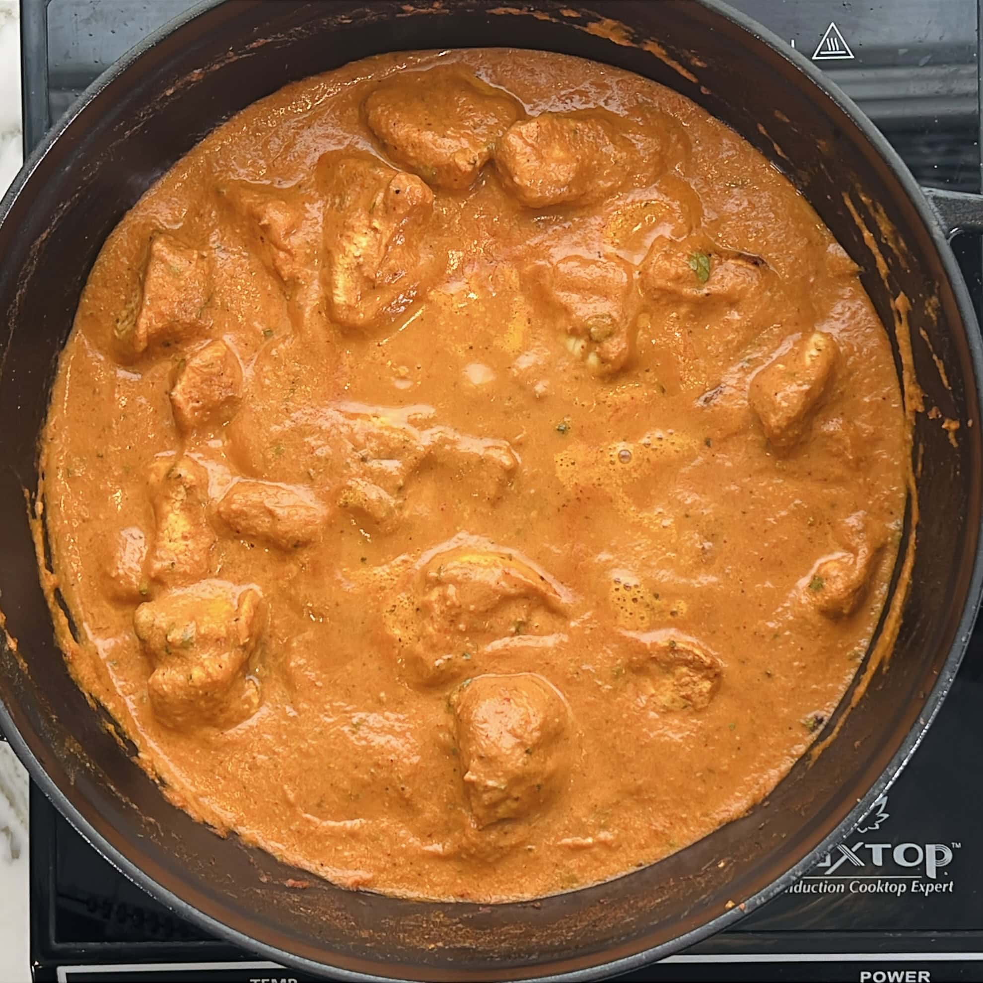 chicken tikka masala in a pan.