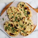 garlic naan on a platter