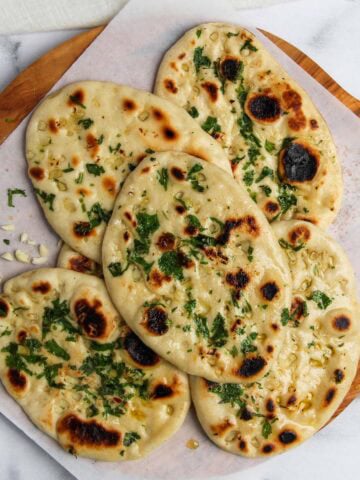 garlic naan on a platter