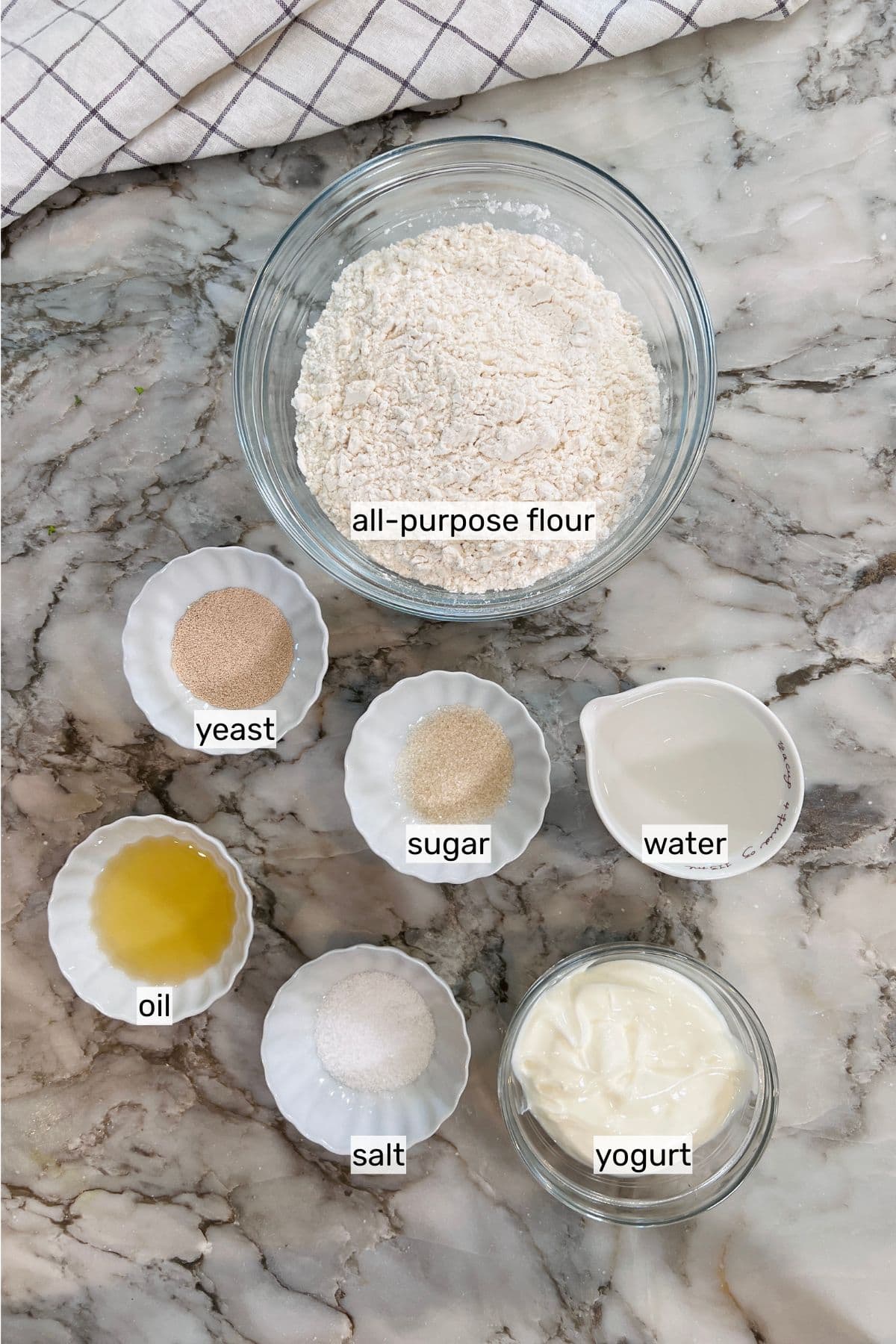 ingredients to make homemade naan bread with yeast