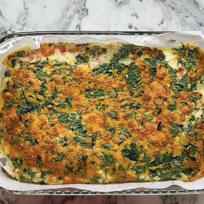 veggie egg white bake in a glass baking dish.