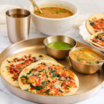Instant uttapam sserved with sambar and chutney