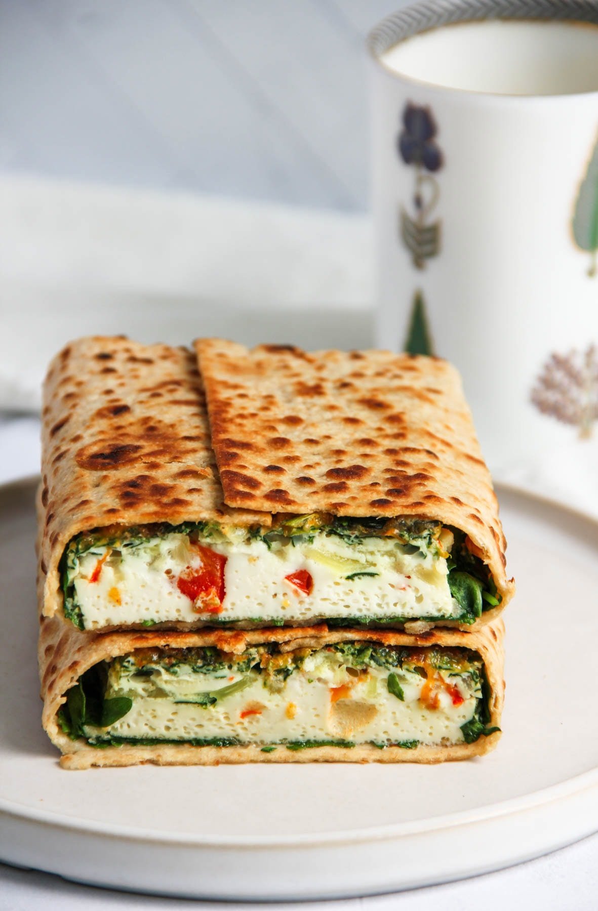 veggie egg white wraps on a white serving dish 